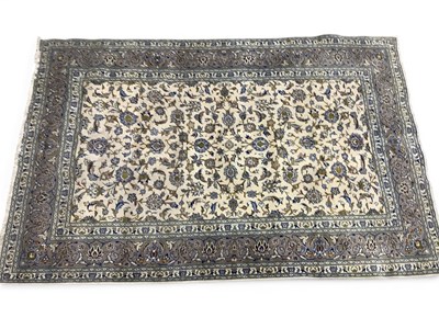 Lot 1592 - A large handmade Kashan Persian rug with...