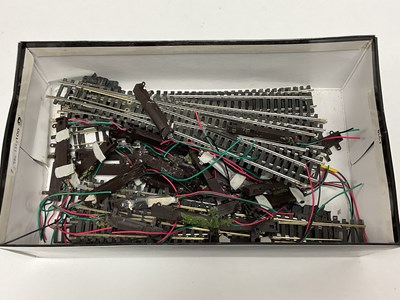 Lot 465 - Twelve Hornby and Peco 00 gauge points, with...