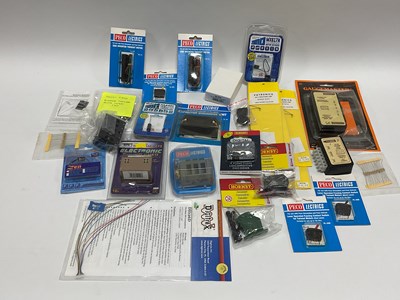 Lot 449 - A box of model railway electrical and...