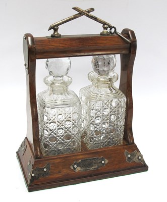 Lot 1412 - Oak Tantulus with Plated Mounts, holding two...