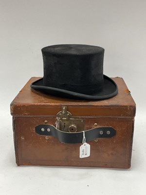 Lot 1610 - A Black Top Hat, in a brown leather box.