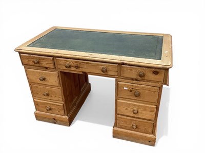 Lot 1556 - Pine Desk with scriver to three drawer top on...