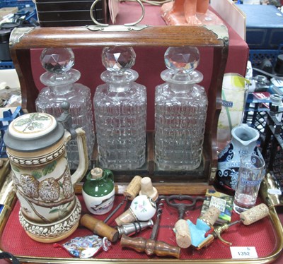 Lot 1392 - Oak Tantalus (front absent), corkscrews,...