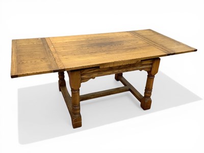 Lot 1580 - XVII Century Style Oak Draw-leaf Table on...