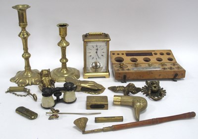 Lot 1317 - Brass Weights Cased, XVIII brass candlesticks,...