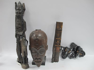 Lot 1147 - Two Carved African Hardwood Figure Groups, the...