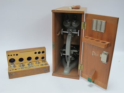Lot 1436 - Beck of London Microscope, box of weights (2).