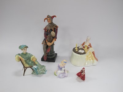 Lot 1207 - Five Royal Doulton porcelain figures: Jester...