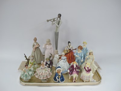 Lot 1203 - Collection of porcelain figures, in various...