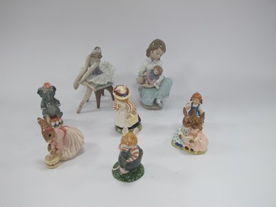 Lot 1205 - Collection of porcelain figures, including two...