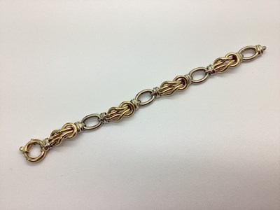 Lot 117 - A Modern 9ct Yellow and White Gold Fancy Link...