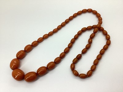 Lot 158 - A Single Strand Graduated Amber Colour Bead...