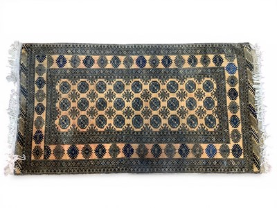 Lot 1589 - Middle Eastern Wool Tassled Rug, with...