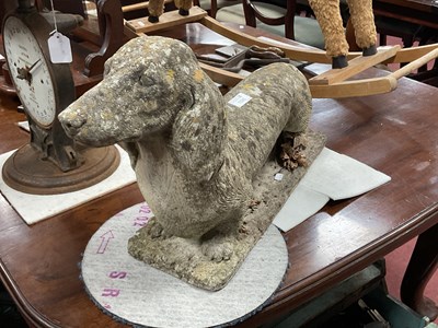 Lot 1525 - Garden Figure of Dachshund, 33cm high, 60cm wide.
