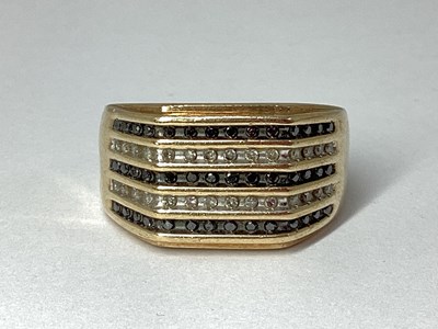 Lot 79 - The Genuine Gemstone Company; A Gent's 9ct...