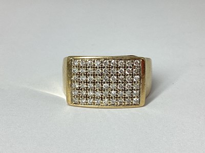 Lot 90 - A Gent's 9ct Gold Diamond Set Ring, the...