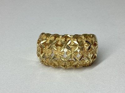 Lot 88 - QVC; A Wide 9ct Gold Openwork Band, of floral...