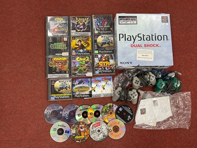 Lot 747 - A Sony PlayStation (PS1) Gaming Console (pen...