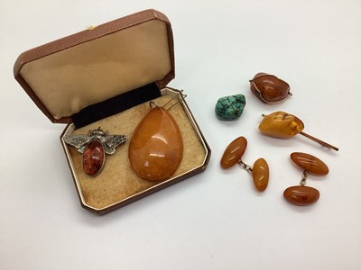 Lot 166 - A Pair of Oval Amber Coloured Cufflinks, chain...