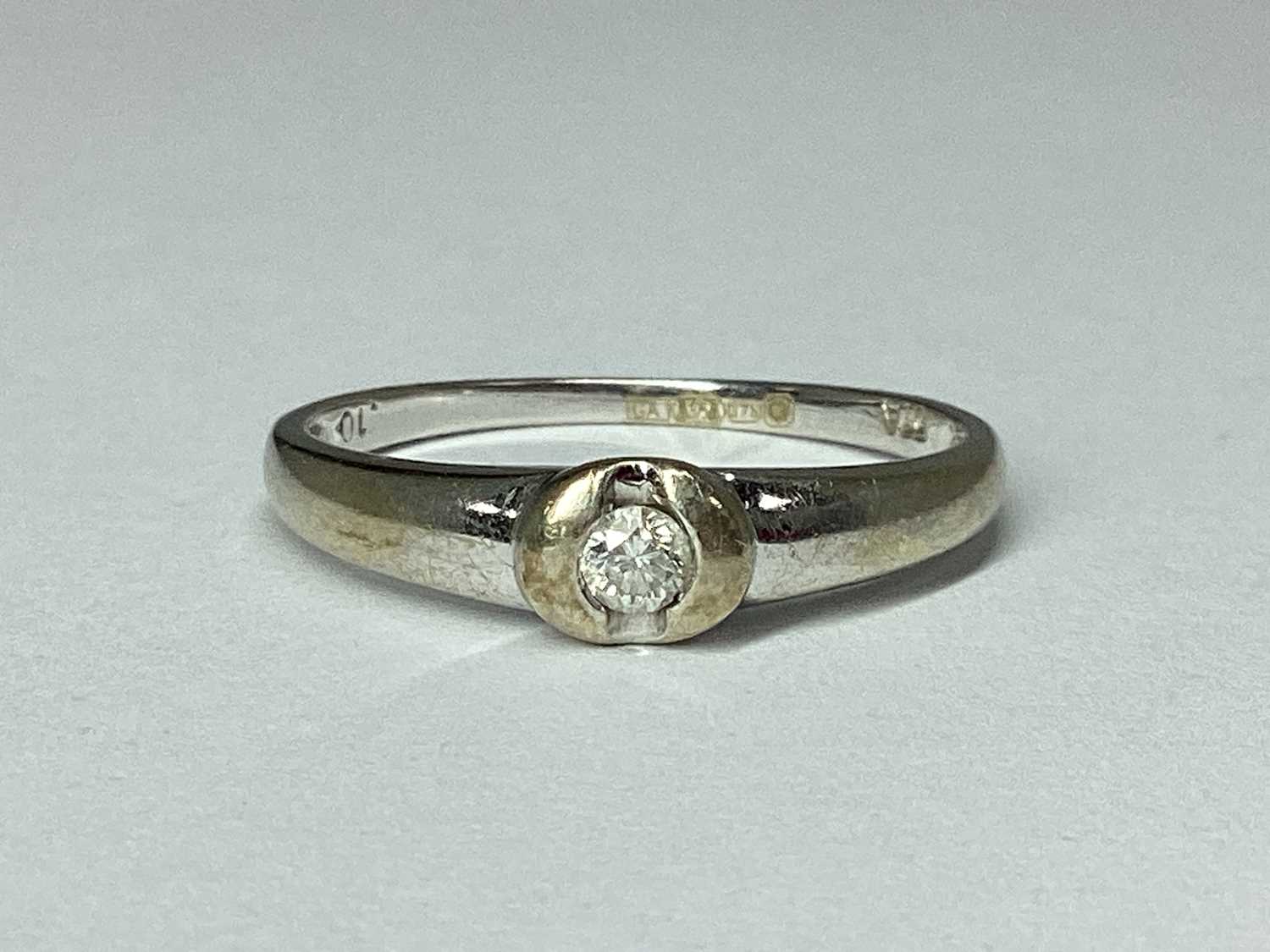 Lot 94 - A Modern 9ct White Gold Single Stone Diamond...