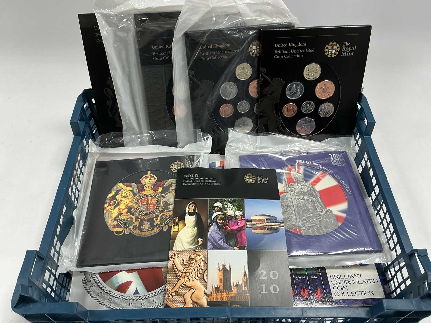 Lot 470 - Fourteen Royal Mint UK Bunc Coin Packs, 1990's...