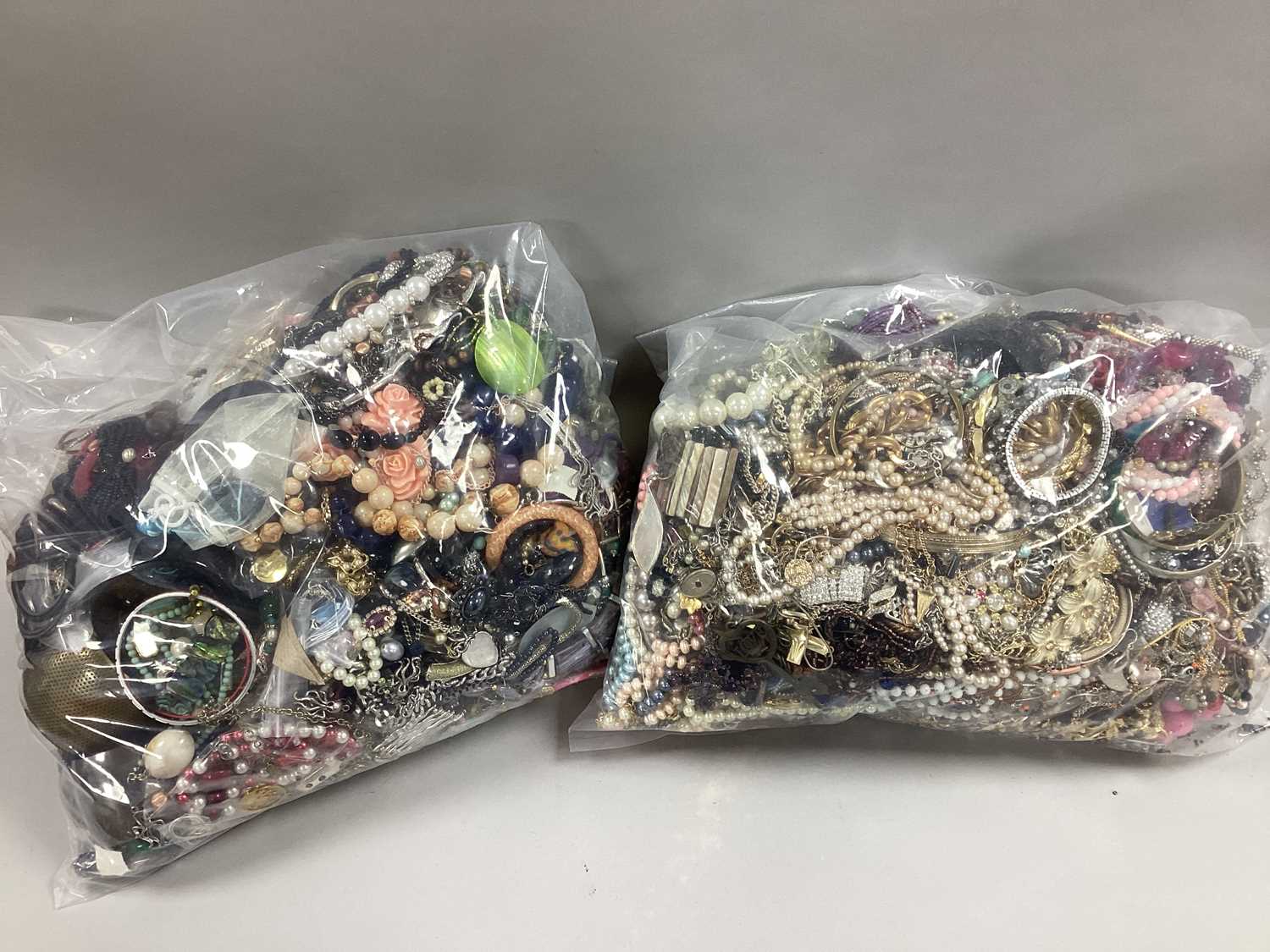 Lot 73 - A Mixed Lot of Assorted Costume Jewellery :-...
