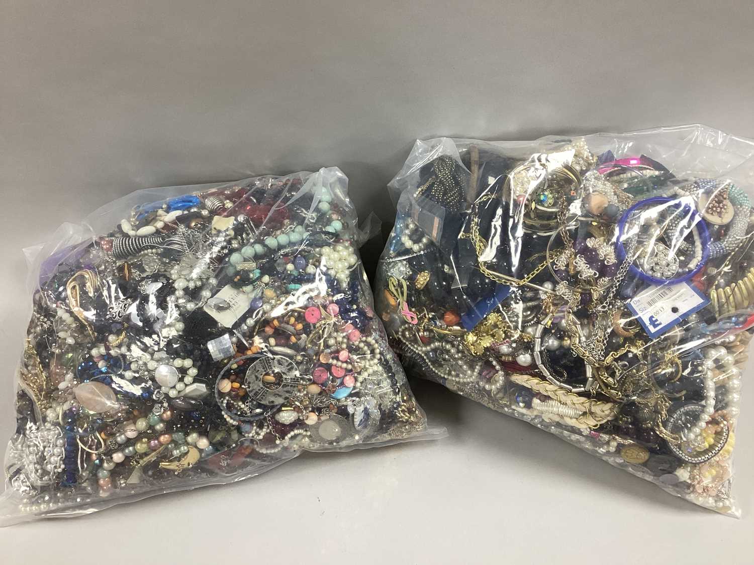 Lot 74 - A Mixed Lot of Assorted Costume Jewellery :-...