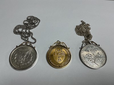 Lot 552 - Three Silver Coins, includes a 1921 USA...