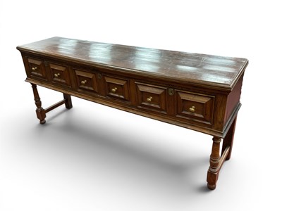 Lot 1475 - A XVII Century Style Oak Moulded Front Dresser...