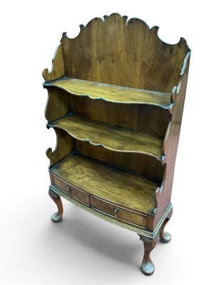 Lot 1467 - A XX Century Walnut Bookcase, with shaped top,...