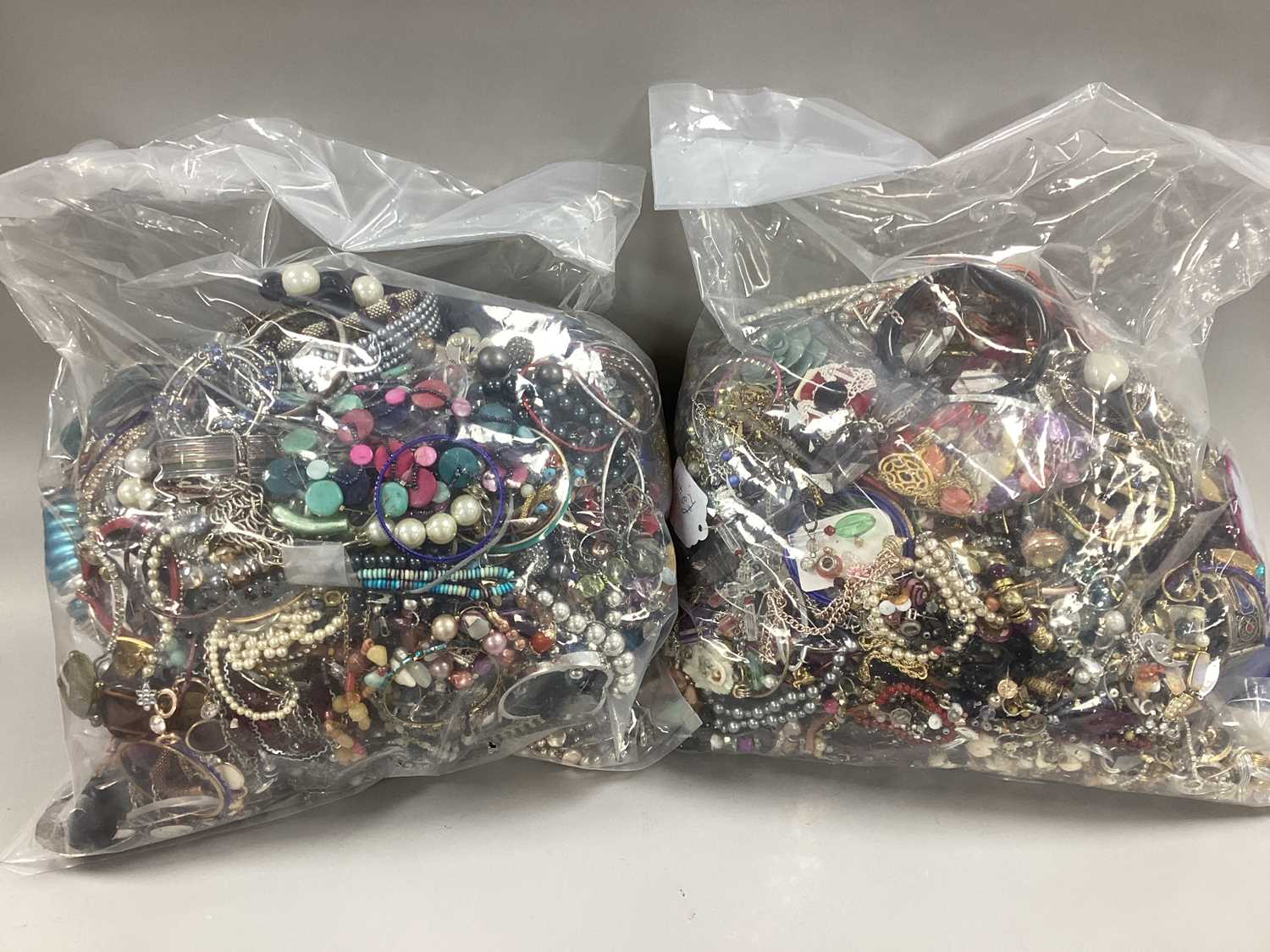 Lot 47 - A Mixed Lot of Assorted Costume Jewellery :-...