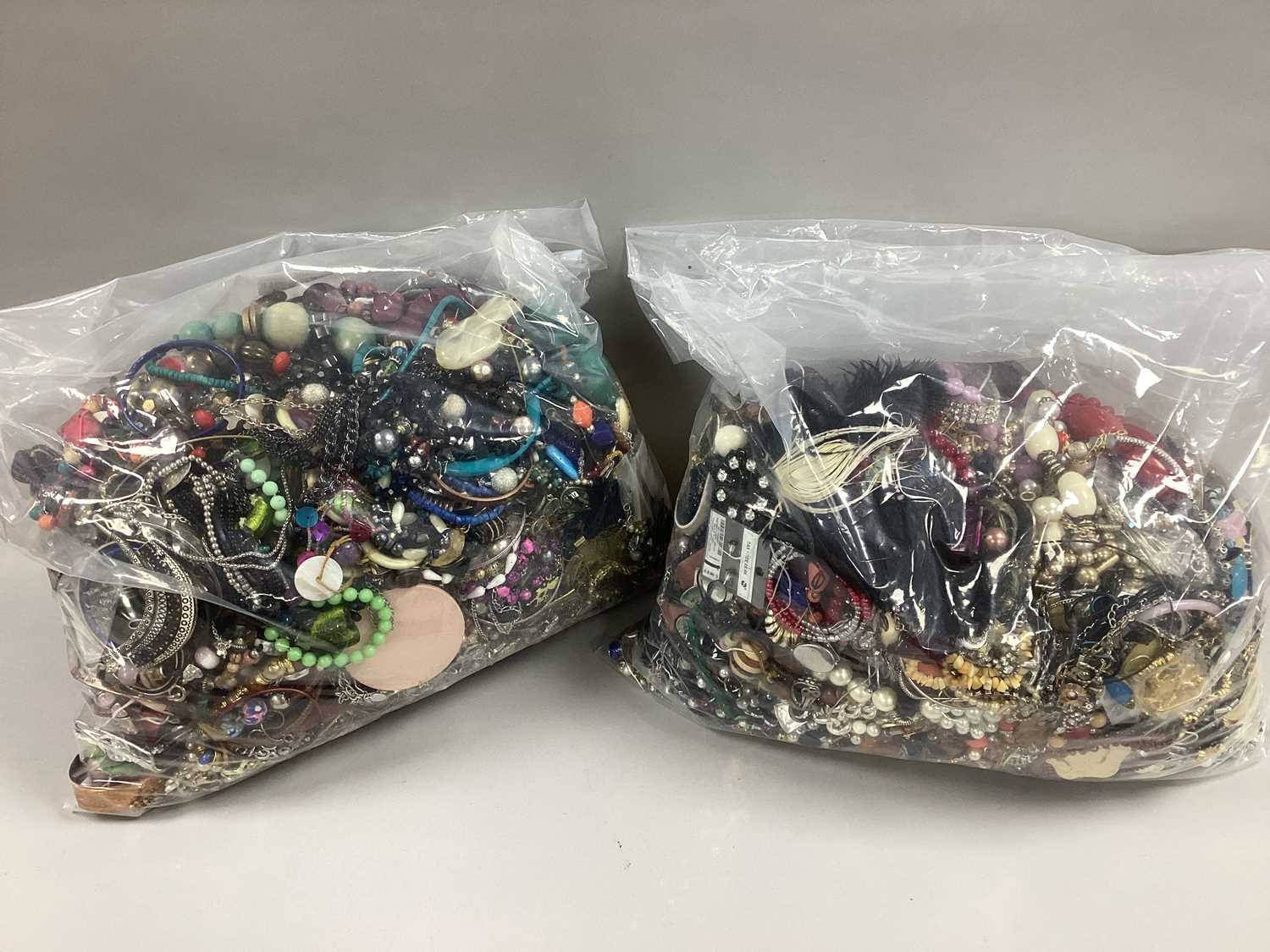 Lot 48 - A Mixed Lot of Assorted Costume Jewellery :-...