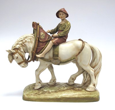 Lot 1061 - A Royal Dux Pottery Figure of Young Boy Upon...