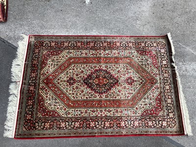 Lot 1474 - A Silk Persian Ghom Rug, decorated with floral...