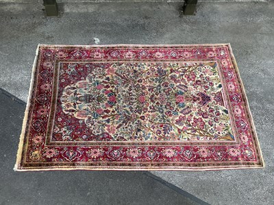Lot 1471 - A Silk Kashan Rug decorated with a central...