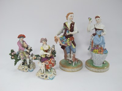Lot 1263 - A Pair of Dresden Flower Seller Figurines,...