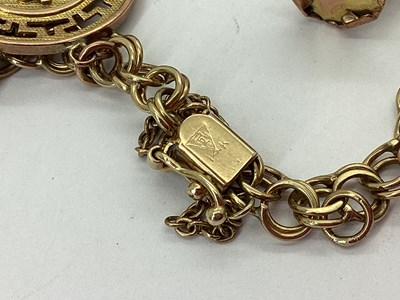 Lot 86 - A Fancy Link Charm Bracelet, to snap clasp...