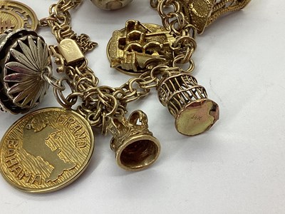 Lot 86 - A Fancy Link Charm Bracelet, to snap clasp...