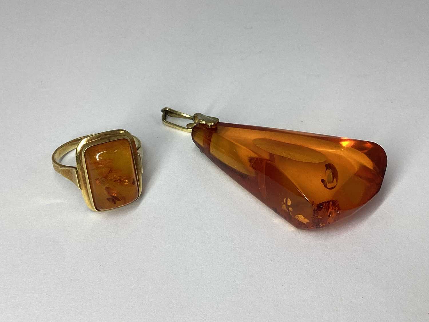 Lot 69 - A Modern Amber Coloured Ring, rectangular...
