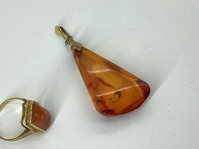 Lot 69 - A Modern Amber Coloured Ring, rectangular...