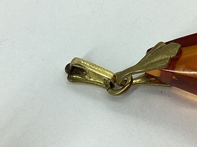 Lot 69 - A Modern Amber Coloured Ring, rectangular...