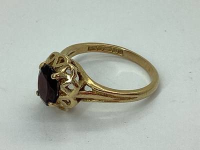 Lot 73 - A 9ct Gold Dress Ring, oval claw set, within...