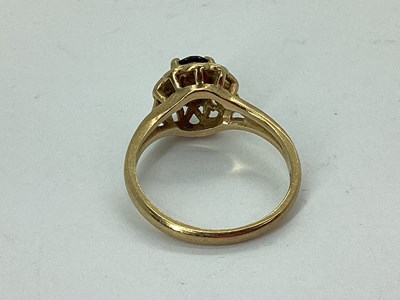 Lot 73 - A 9ct Gold Dress Ring, oval claw set, within...