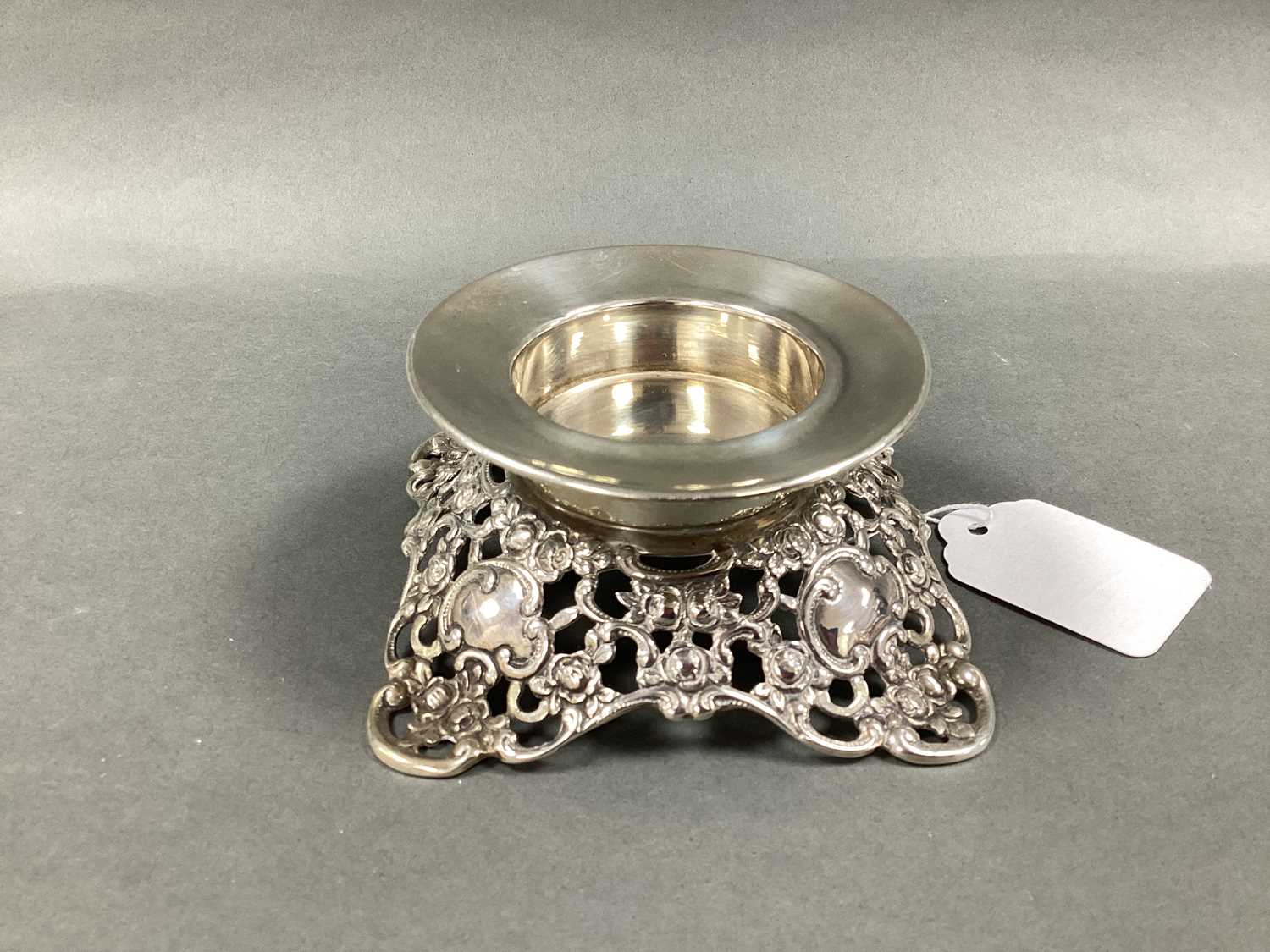Lot 9 - A Decorative Stand / Candle Holder, on scroll...