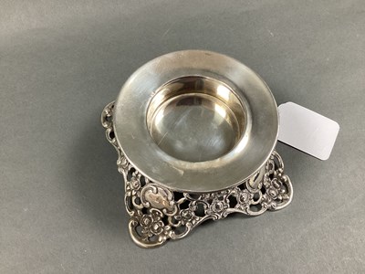 Lot 9 - A Decorative Stand / Candle Holder, on scroll...