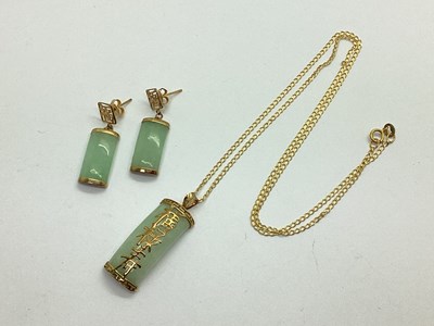 Lot 87 - A Modern Jade Pendant, with applied Chinese...