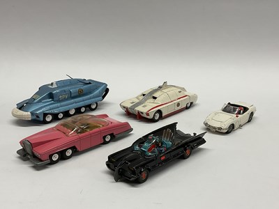 Lot 879 - Five original Corgi and Dinky Film/TV related...