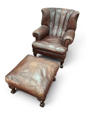 Lot 1578 - An Ox Blood Red Leather Armchair with Stud...