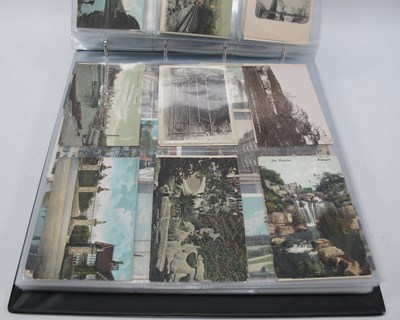 Lot 1354 - An Album of Early XX Century Picture Postcards,...