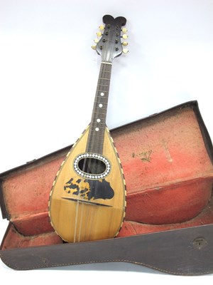 Lot 1301 - An Italian Mandolin, with mother of pearl and...